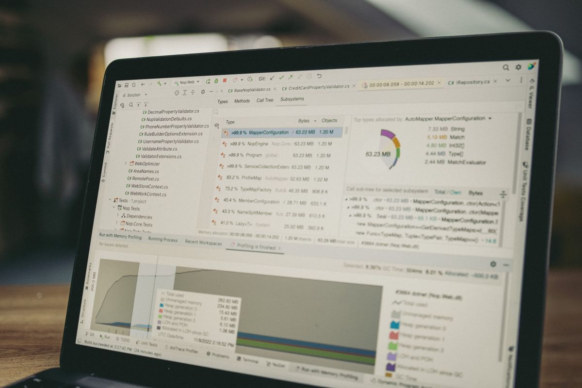 Laptop displaying financial data and analysis